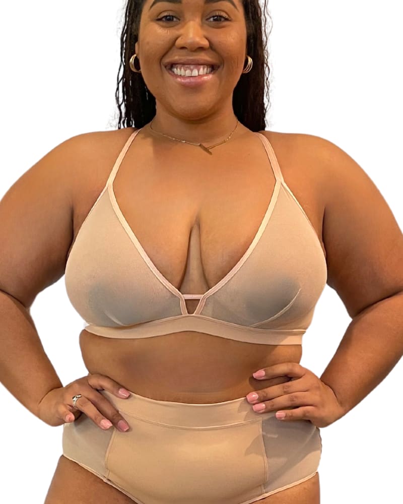 Front of a model wearing a size 2X Nude Shade Mesh Racerback Bra in Honey by Naked Rebellion. | dia_product_style_image_id:327950